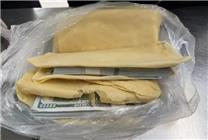 煎餅里藏現(xiàn)金 旅客帶32萬美元出境被查 科普：不能超5000美元